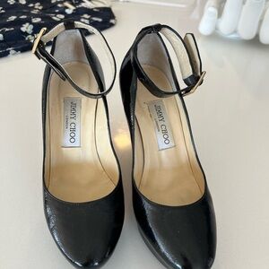Jimmy Choo patent platform wedges with an ankle strip in perfect condition